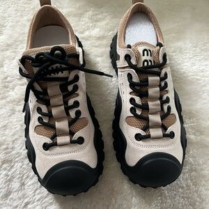 Stylish Beige and Black Suede Sneakers